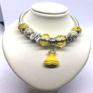 Stunning Silver Twist Bracelet with Yellow and Silver Beads and Dress Charm